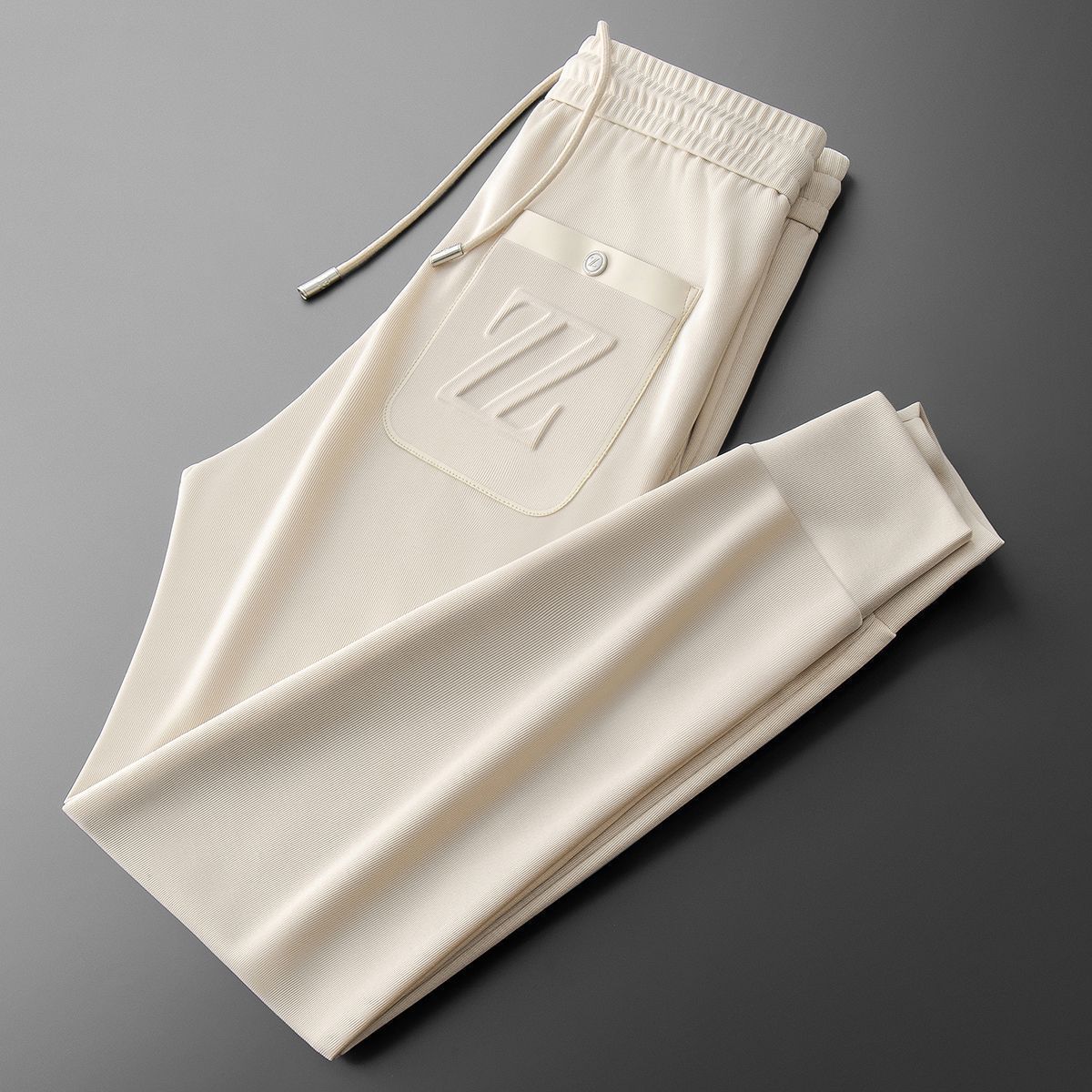 Moda Elite | Sportowe spodnie dresowe z haftem