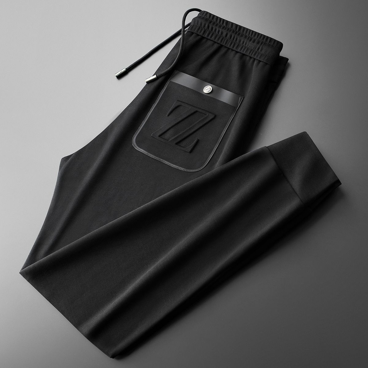 Moda Elite | Sportowe spodnie dresowe z haftem