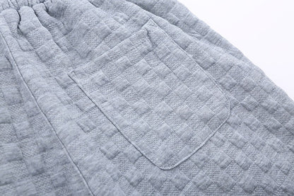 Luźne spodnie dzianinowe w kratkę