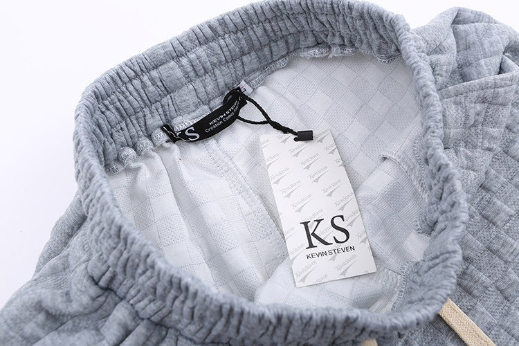 Luźne spodnie dzianinowe w kratkę