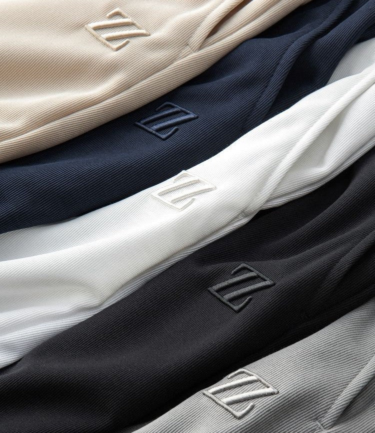 Moda Elite | Sportowe spodnie dresowe z haftem