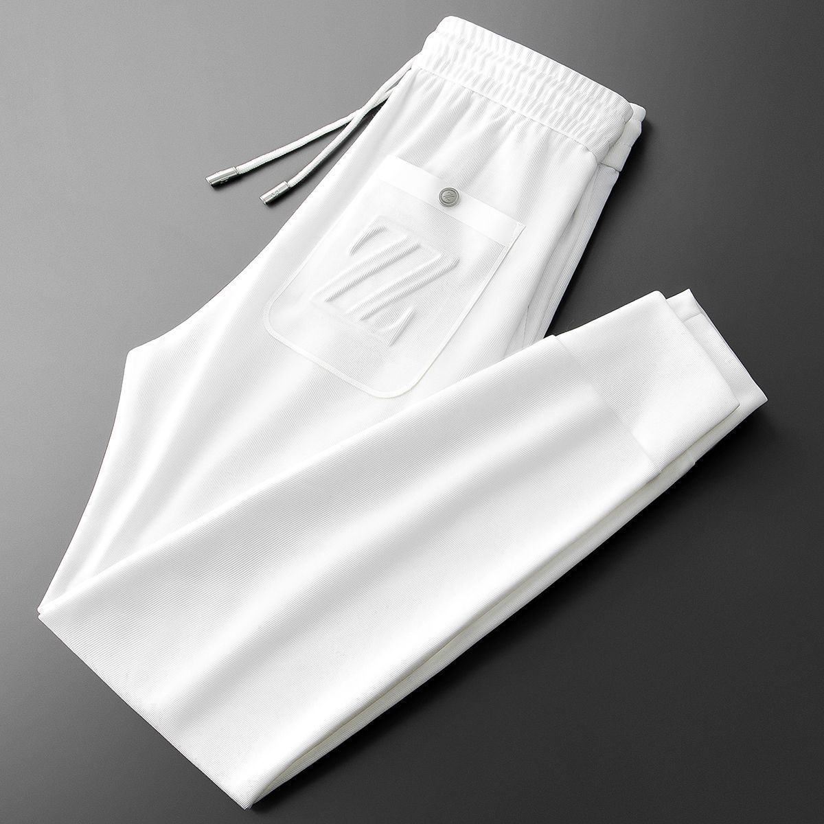 Moda Elite | Sportowe spodnie dresowe z haftem