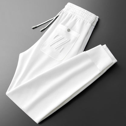 Moda Elite | Sportowe spodnie dresowe z haftem